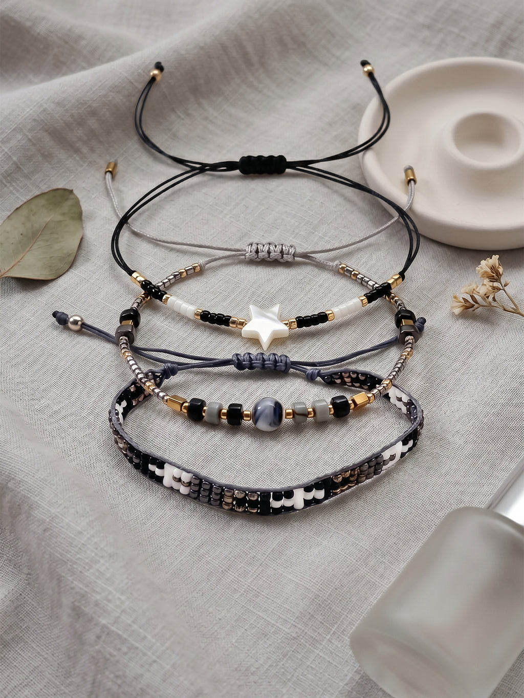 Black, White and Gold-Tone braided three-piece bracelet set with adjustable pull cords | BRA509-01 | image 4