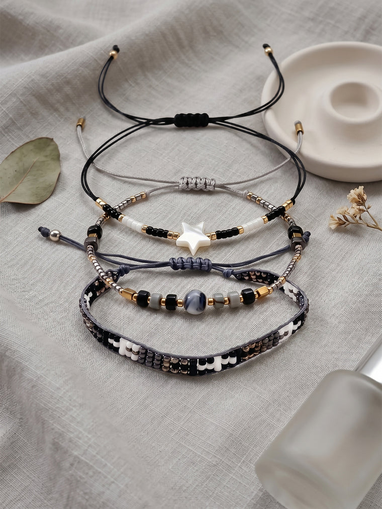 Black, White and Gold-Tone braided three-piece bracelet set with adjustable pull cords | BRA509-01 | image 4