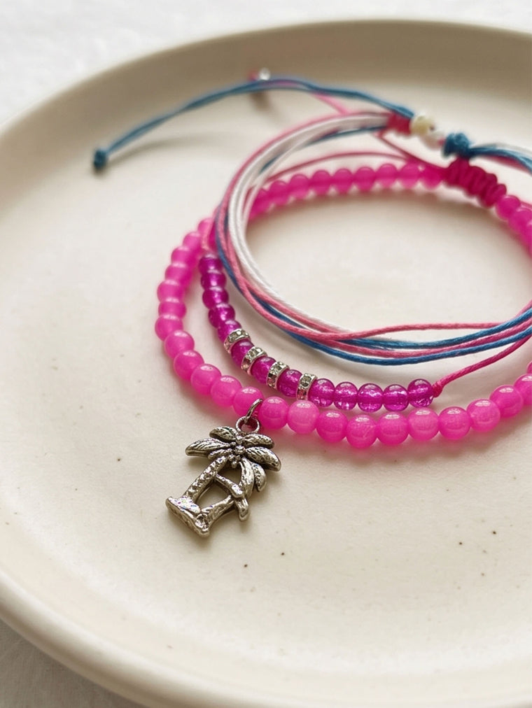 Fuchsia braided three-piece bracelet set with adjustable pull cords | BRA562-01 | image 4