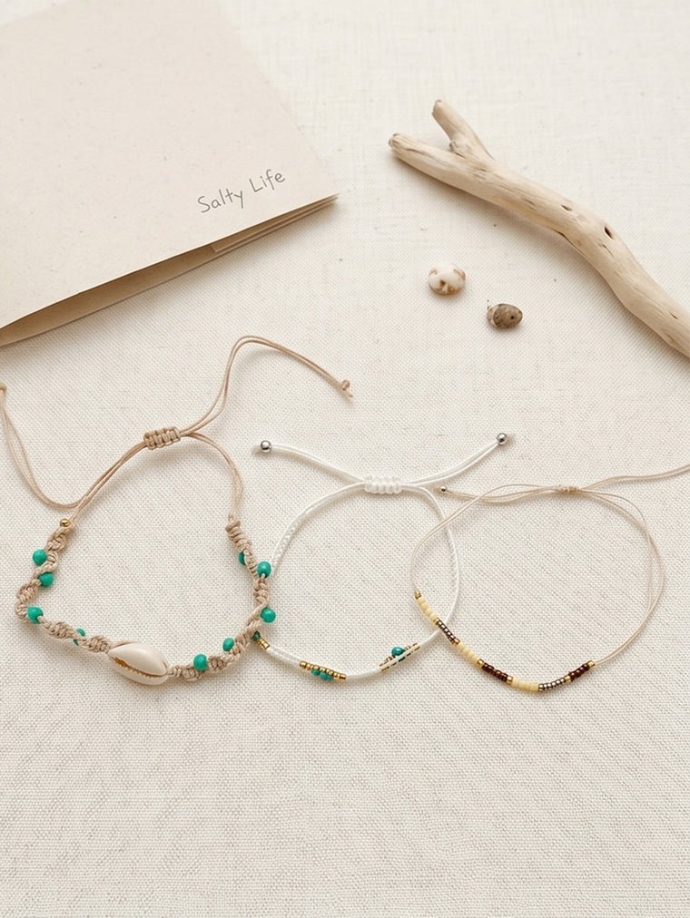 White braided three-piece bracelet set with adjustable pull cords | BRA559-01 | image 4