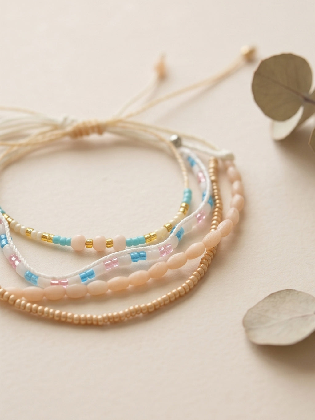Beige braided three-piece bracelet set with adjustable pull cords | BRA586-01 | image 4