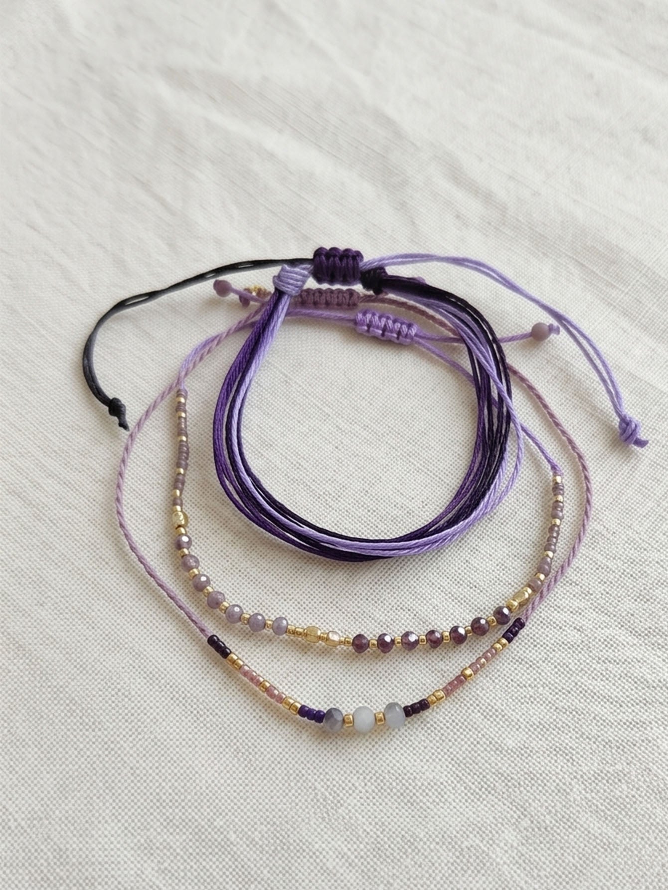 Dark Purple braided three-piece bracelet set with adjustable pull cords | BRA561-01 | image 4