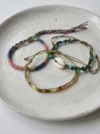 Green braided three-piece bracelet set with adjustable pull cords | BRA578-01 | image 4
