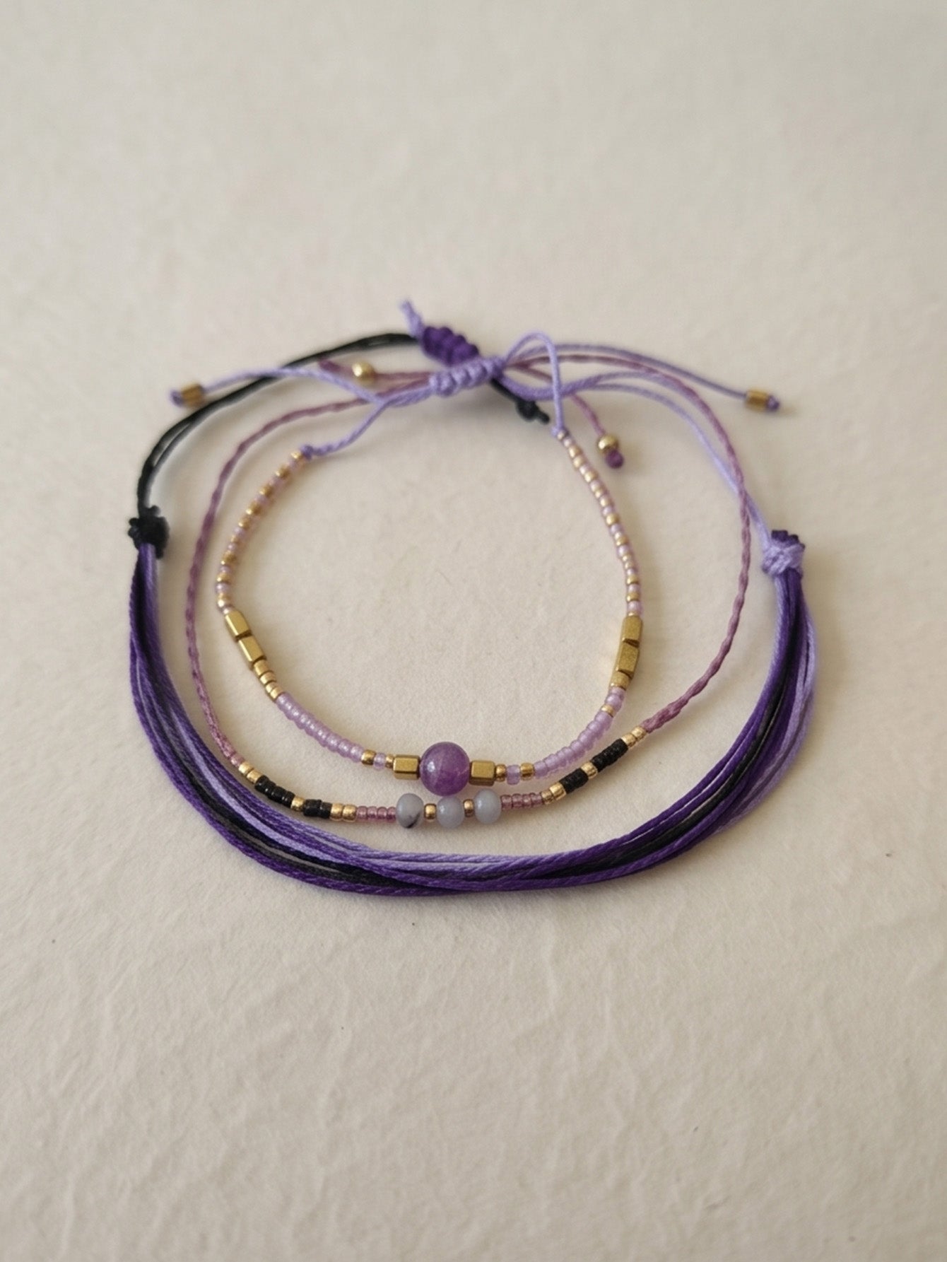 Purple braided three-piece bracelet set with adjustable pull cords | BRA590-01 | image 4