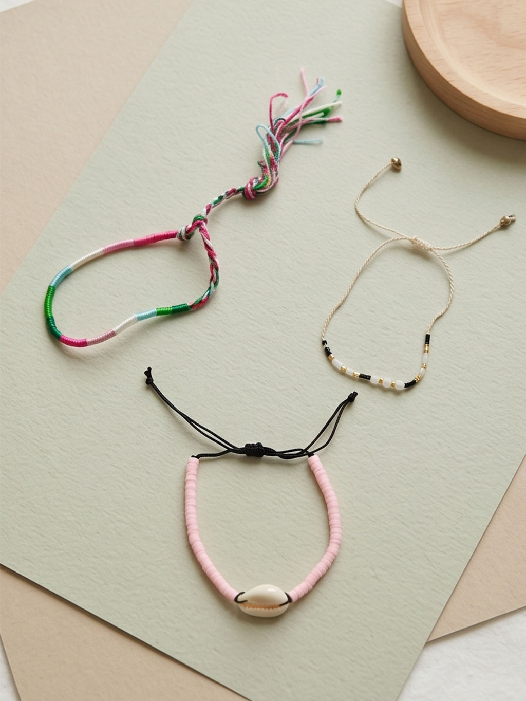 Pink braided three-piece bracelet set with adjustable pull cords | BRA564-01 | image 4