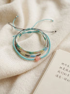 Blue braided three-piece bracelet set with adjustable pull cords | BRA565-01 | image 4