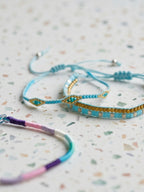 Blue braided three-piece bracelet set with adjustable pull cords | BRA574-01 | image 4