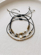 Black braided three-piece bracelet set with adjustable pull cords | BRA569-01 | image 4