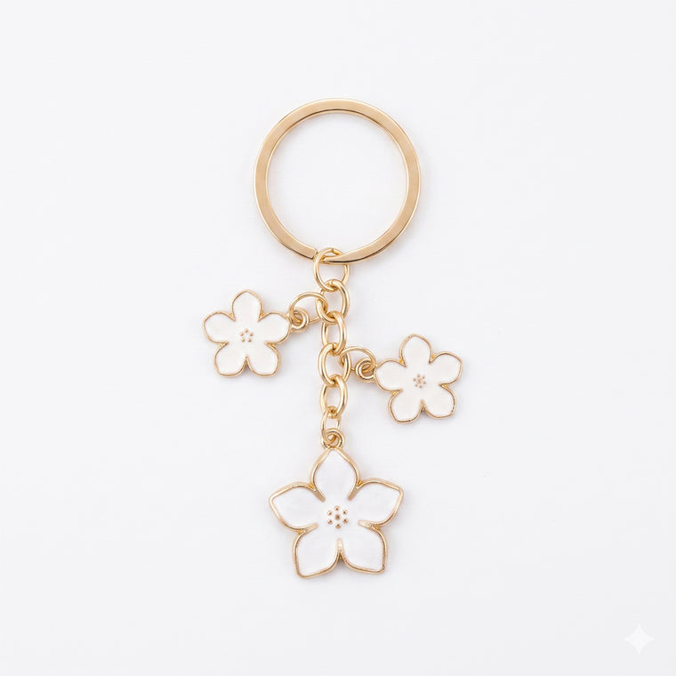 White cherry blossom keychain with floral accents