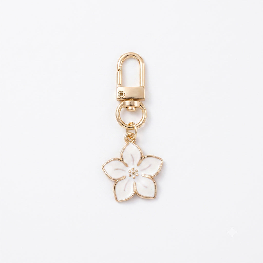 White cherry blossom keychain with floral accents