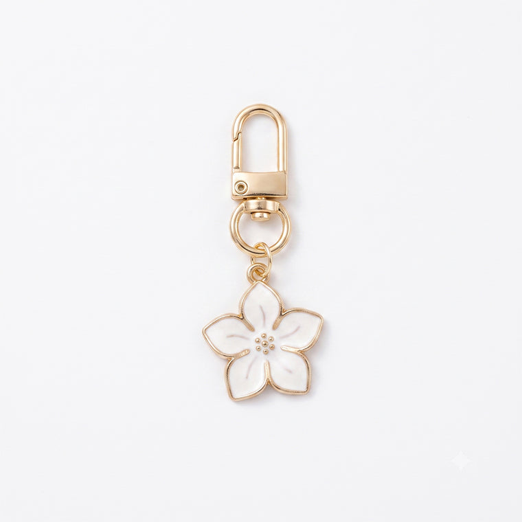 White cherry blossom keychain with floral accents