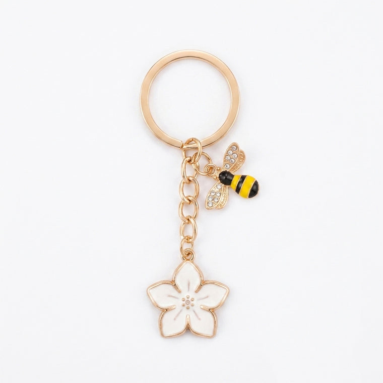White cherry blossom keychain with bee accent