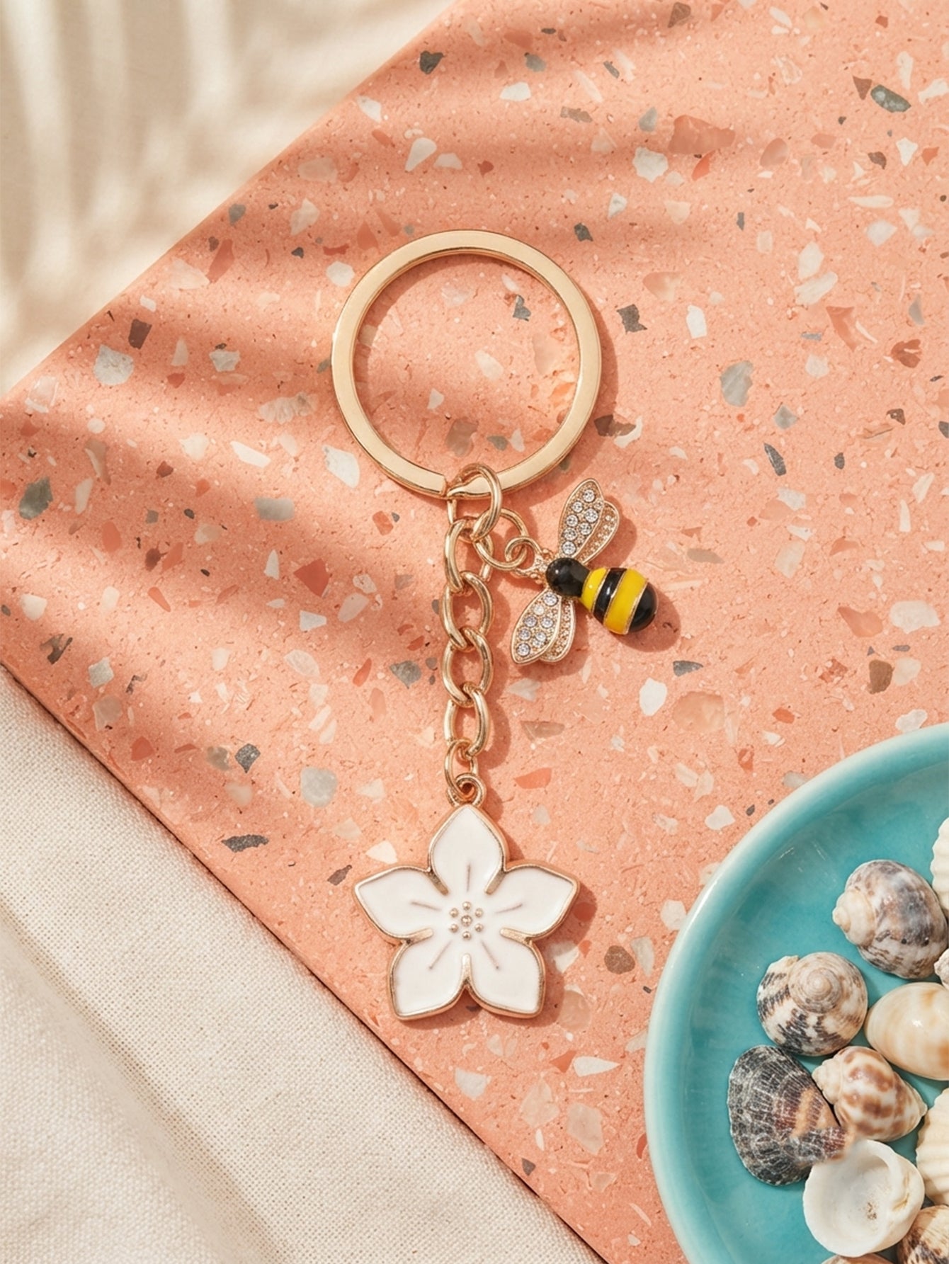 White cherry blossom keychain with bee accent - detail view 3