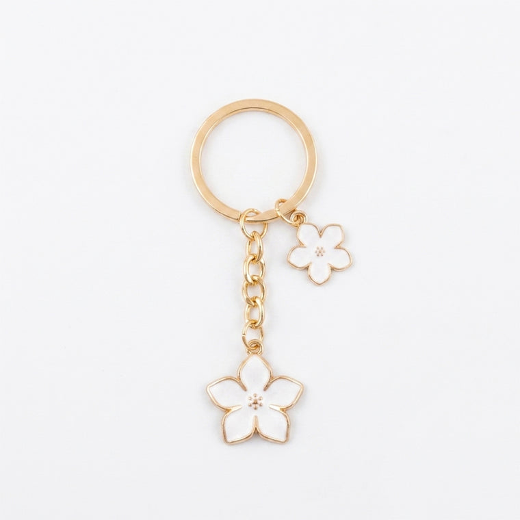 White cherry blossom keychain with floral accents