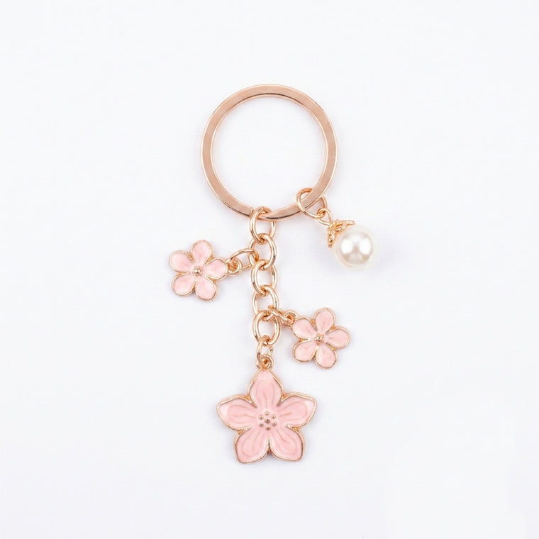 Pink cherry blossom keychain with pearl details
