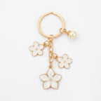 White cherry blossom keychain with pearl details