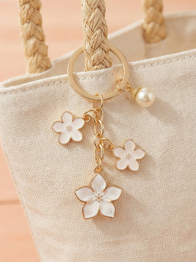 White cherry blossom keychain with pearl details - detail view 2