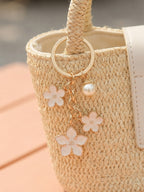 White cherry blossom keychain with pearl details - detail view 3