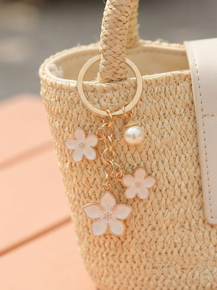 White cherry blossom keychain with pearl details - detail view 3